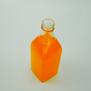 Fruit juice glass bottle